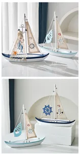 Mediterranean wooden sailboat model ornament detail, creative home decor in blue white.