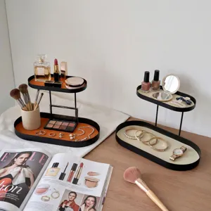 Étagère de rangement cosmétique de bureau en fer à double niveau avec plateau en cuir chic.