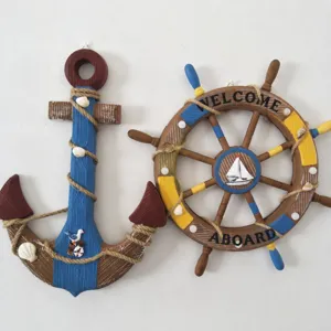 Mediterranean style wooden anchor and steering wheel wall hanging decor for home.