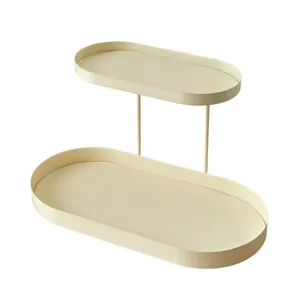 Plateau de rangement ovale en métal à deux niveaux, organisateur de cosmétiques élégant.