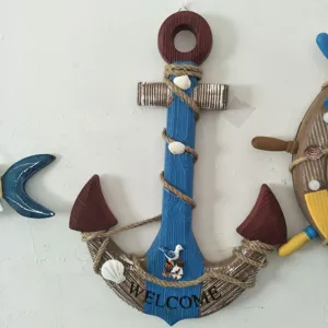 Mediterranean style wooden anchor wall decor with rope and shells, vintage home hanging ornament.