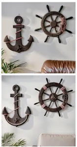 Mediterranean style vintage wooden ship wheel and anchor wall decor detail showcase piece.