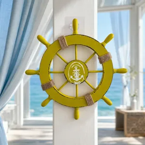 Close-up detail of wooden ship wheel wall hanging, Mediterranean marine style decoration.
