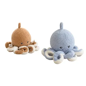 Cute octopus plush door stopper set, soft stuffed animal cartoon blocker in brown and blue colors.