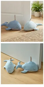 Cute whale fabric doorstop detail view, striped design, sand filled home decorative ornament.