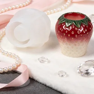 Strawberry silicone mold set with finished flower pot, perfect for DIY crafts and decor.