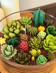 Detailed succulent and cactus candle set in glass container for exquisite home decor