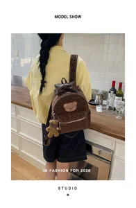 Sweet Japanese style women brown leopard backpack with cute bear pendant and bow detail daily.