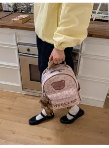Cute Japanese style pink leopard print backpack with sweet bear patch and pendant for girls.