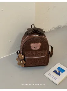 Cute Japanese style brown leopard print mini backpack with bow and bear pendant for girls.