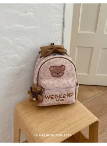 Cute sweet style mini backpack detail, featuring bear patch and adorable furry pendant.