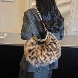 Leopard print plush shoulder bag for women, trendy fluffy crossbody bag for autumn fashion commute.