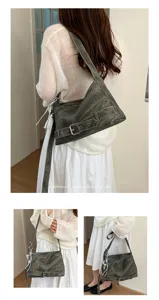 Retro minimalist large capacity shoulder bag for women, vintage distressed commuter crossbody.