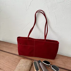 Velvet shoulder bag for women, wine red casual tote bag with large capacity for daily use.