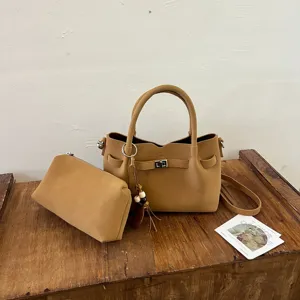 Brown bucket bag with matching clutch, stylish autumn winter shoulder crossbody bag for women.