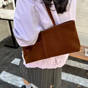 Brown velvet shoulder bag for women, casual tote handbag for daily commute and versatile style.