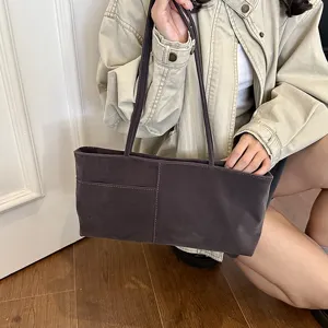 Casual suede shoulder bag for women, large capacity minimalist tote and daily commuter bag.
