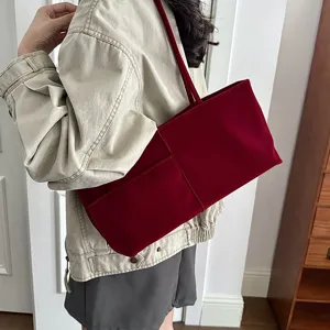 Red velvet shoulder bag for women, large capacity casual tote bag, commuting underarm handbag.