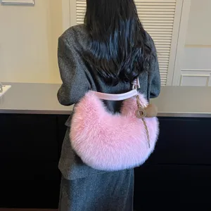 Stylish pink plush hobo shoulder bag for women, fluffy crescent cross body purse chic.