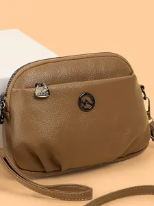 Damen Weiches PU Leder Kleine Umhängetasche Einfach Pendeln Schulter Handytasche Mit Metall Känguru Logo Dekor
