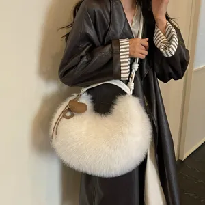 Fluffy white plush hobo shoulder bag, cozy crescent crossbody purse with stylish knot strap.