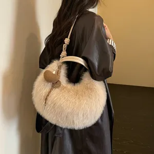 Chic beige plush shoulder bag for women, trendy hobo crescent bag with cute heart charm.