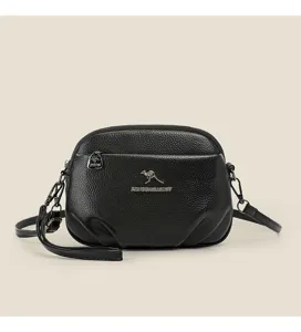 Élégant sac bandoulière noir pour femme, sac à épaule souple et tendance avec poche zippée.