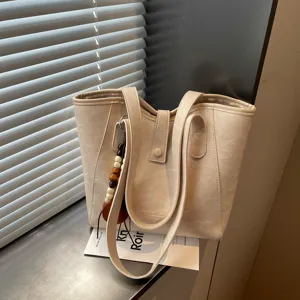 Elegante bolso tote de cuero PU beige para mujer, bolso de hombro de gran capacidad.