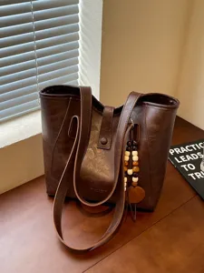 Bolso tote clásico de piel PU marrón oscuro para mujer, bolso de hombro vintage de gran capacidad.