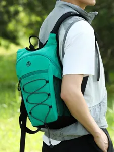 Lightweight outdoor hiking backpack, travel sport green daypack with bungee cords and mesh pockets.