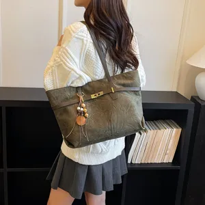 Women large capacity shoulder tote bag, casual PU leather handbag with buckle decor.