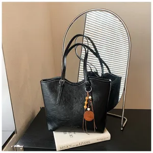 Bolso tote negro de cuero PU grande para mujer, bolso de hombro minimalista de moda.