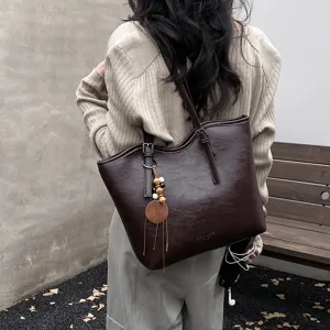 Bolso tote grande para el trabajo, elegante bolso de hombro liso para uso diario y moda chic.