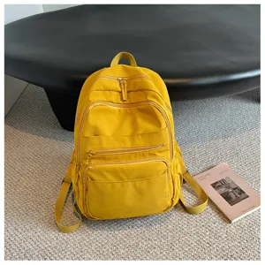 Stylish women yellow casual backpack for school, outdoor travel, and daily commuting use.