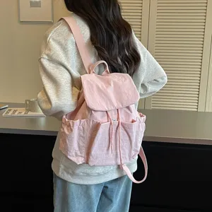 Sac à dos décontracté en tissu rose pour femmes, léger, grande capacité, voyage et école.