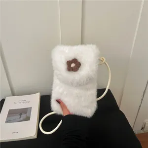 White faux fur crossbody phone bag with cute brown flower, trendy plush shoulder bag for women.