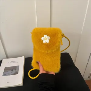 Yellow plush phone crossbody bag with cute white flower detail, soft fuzzy mini shoulder bag.
