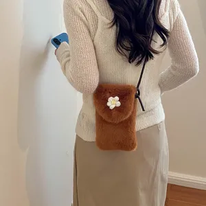 Cute brown plush cross-body phone bag for women, cozy fuzzy mini shoulder bag with floral decor.