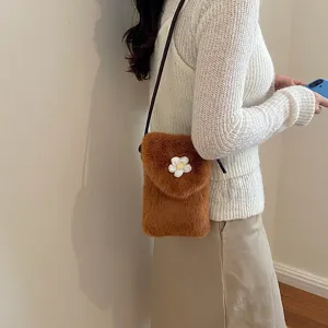 Cute brown plush mobile phone bag, fuzzy crossbody shoulder bag with sweet white flower decor.