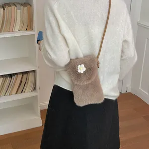 Chic brown plush crossbody phone bag with cute white flower, soft fuzzy small shoulder bag.