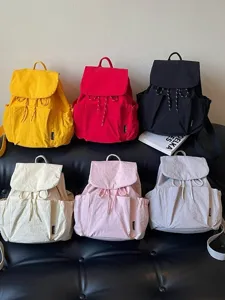 Sac à dos en toile décontracté pour femme, léger, grande capacité, parfait pour les voyages.