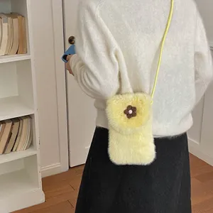 Yellow plush cross-body phone bag for women, cute fluffy mini shoulder purse with flower.