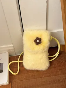 Yellow plush crossbody phone bag with cute brown crochet flower, fuzzy shoulder bag for women.
