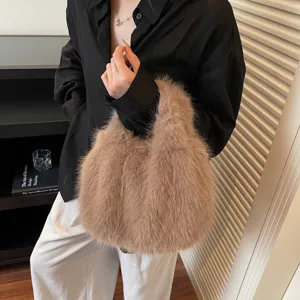 Close-up detail shot of a stylish fluffy faux fur handbag, showcasing soft texture and cozy vibe.