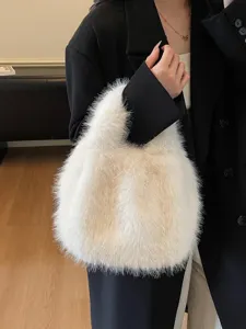 Stylish white fluffy handbag for women, soft plush fuzzy tote bag for autumn and winter fashion.