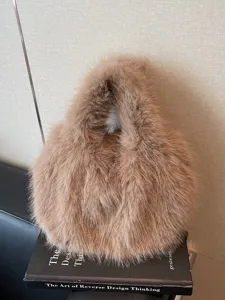 Stylish brown fluffy faux fur handbag for women, autumn and winter fashion portable tote bag.