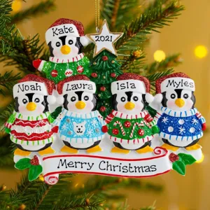 Cute Christmas penguin family tree hanging ornament holiday gift for family decor detail view.