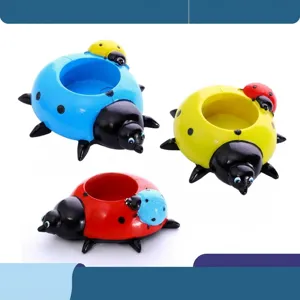 Cute cartoon ladybug shaped desktop storage container or succulent flower pot decoration.