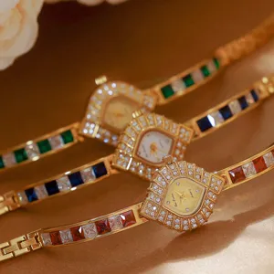 BS vintage retro luxury women quartz watch with colorful gemstone inlaid strap and shield dial.
