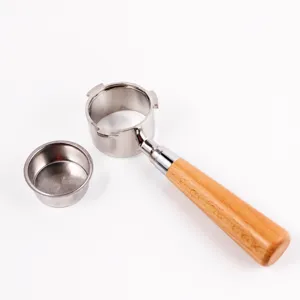 Stainless steel bottomless coffee portafilter detail, wooden handle and metal basket.